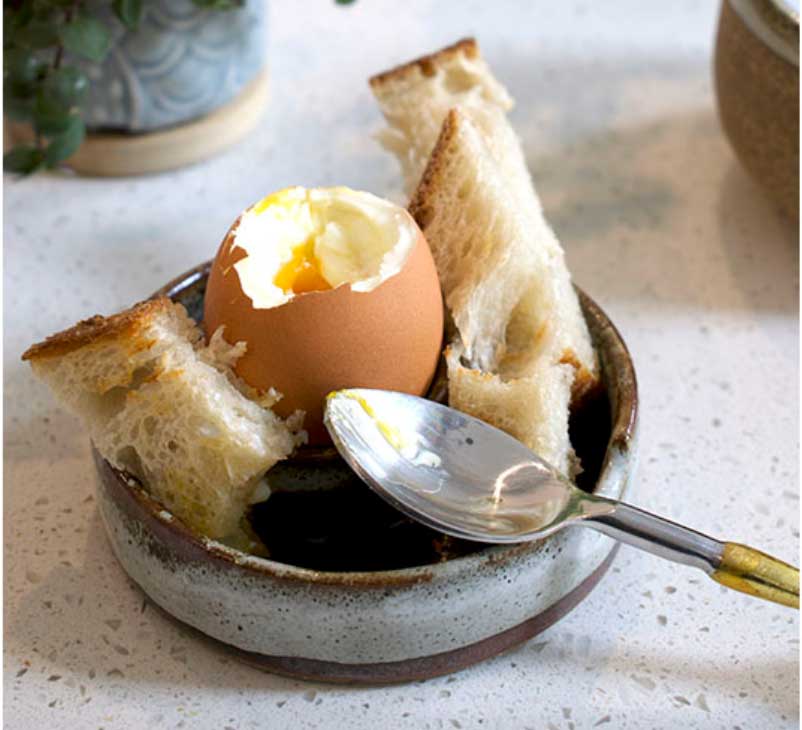 STONEWARE EGG DISH IN TAWNY TOAST